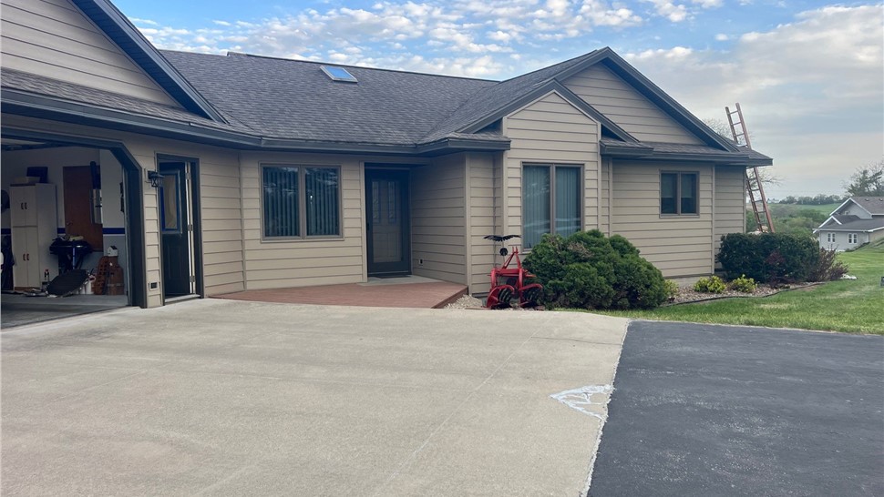 Seamless Gutters, Siding Project in Anita, IA by Midwest Construction