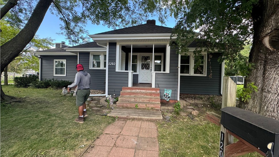 Seamless Gutters, Siding Project in Mason City, IA by Midwest Construction