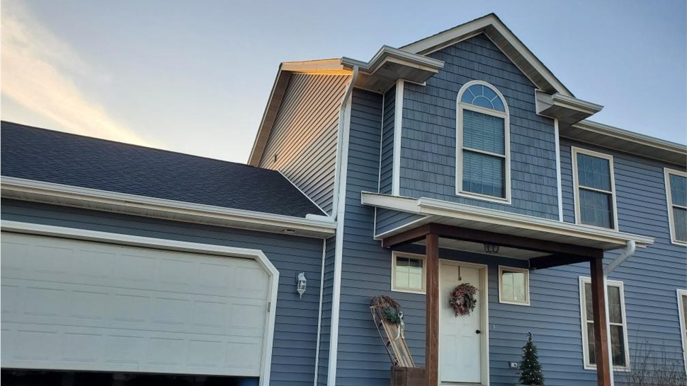 Decks, Doors, Roofing, Seamless Gutters, Siding, Sunrooms, Windows Project in Osceola, IA by Midwest Construction