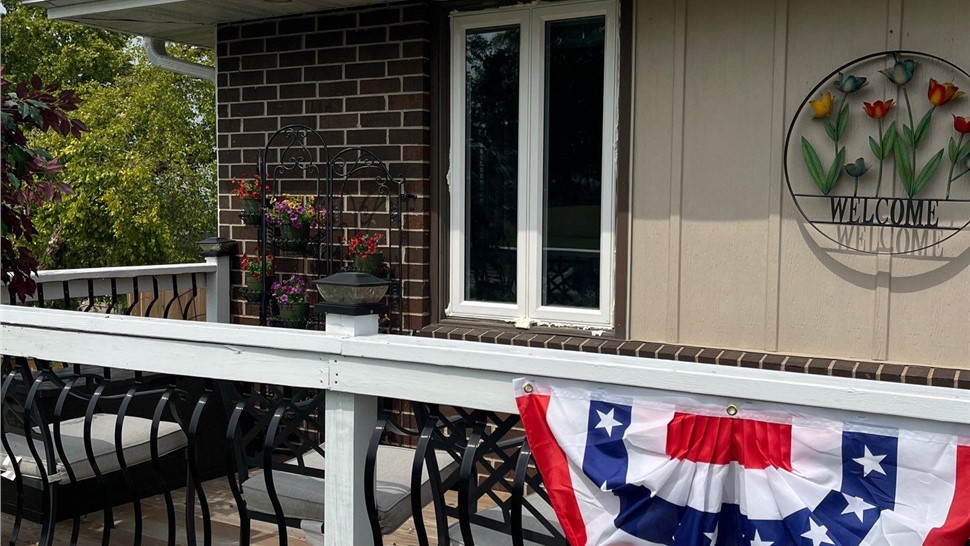Seamless Gutters, Siding Project in Pleasant Hill, IA by Midwest Construction