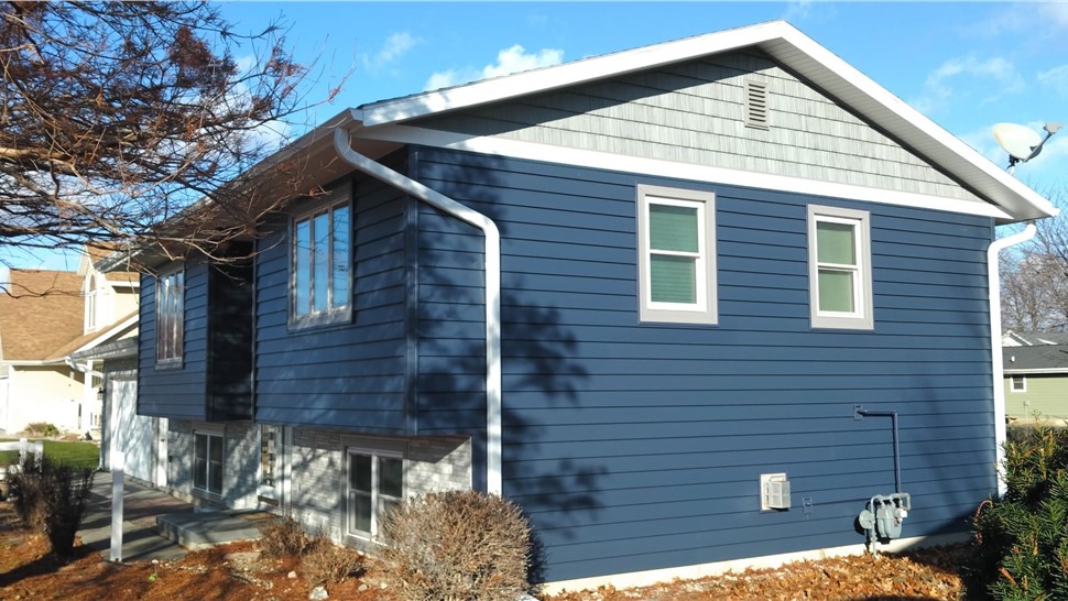 Patio Doors, Seamless Gutters, Siding, Windows Project in Roland, IA by Midwest Construction
