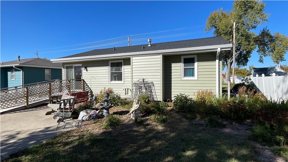 Seamless Gutters, Siding Project in Huxley, IA by Midwest Construction