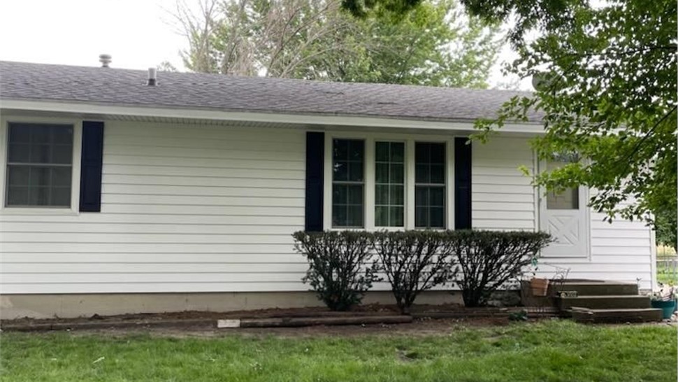 Decks, Seamless Gutters, Siding Project in Bondurant, IA by Midwest Construction
