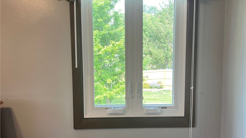 Seamless Gutters, Siding Project in Pleasant Hill, IA by Midwest Construction