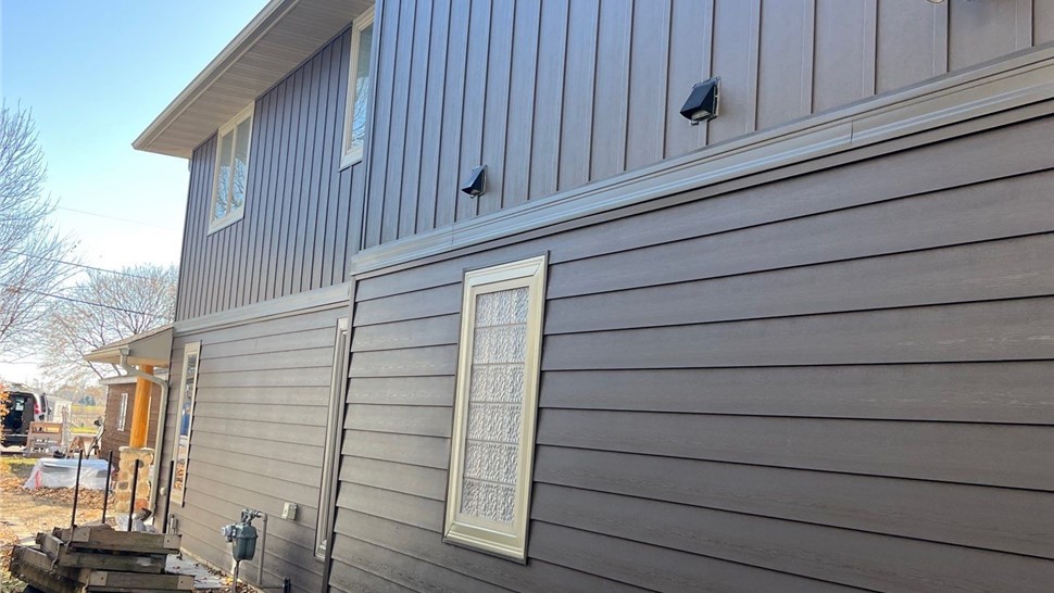 Manufactured Stone Siding, Roofing, Siding Project in Clear Lake, IA by Midwest Construction