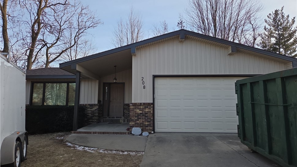 Decks, Doors, Roofing, Seamless Gutters, Siding, Windows Project in Oskaloosa, IA by Midwest Construction