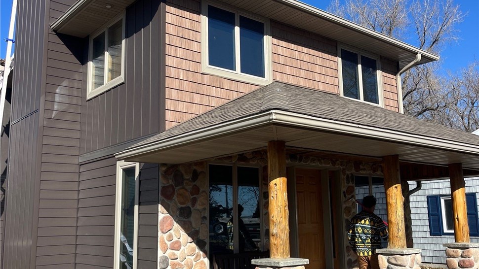 Manufactured Stone Siding, Roofing, Siding Project in Clear Lake, IA by Midwest Construction