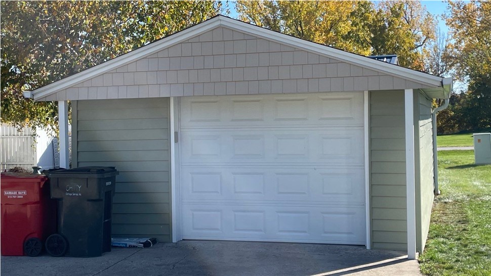 Seamless Gutters, Siding Project in Huxley, IA by Midwest Construction