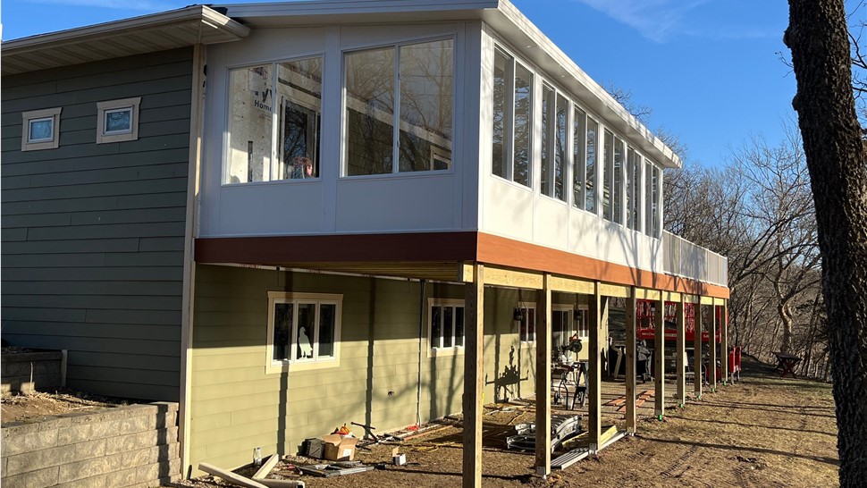Decks, Doors, Manufactured Stone Siding, Patio Doors, Seamless Gutters, Siding, Sunrooms, Windows Project in Floyd, IA by Midwest Construction