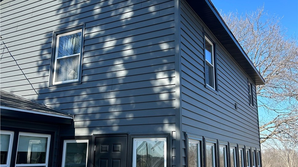 Doors, Siding Project in Runnells, IA by Midwest Construction