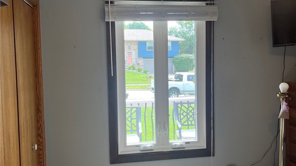 Seamless Gutters, Siding Project in Pleasant Hill, IA by Midwest Construction