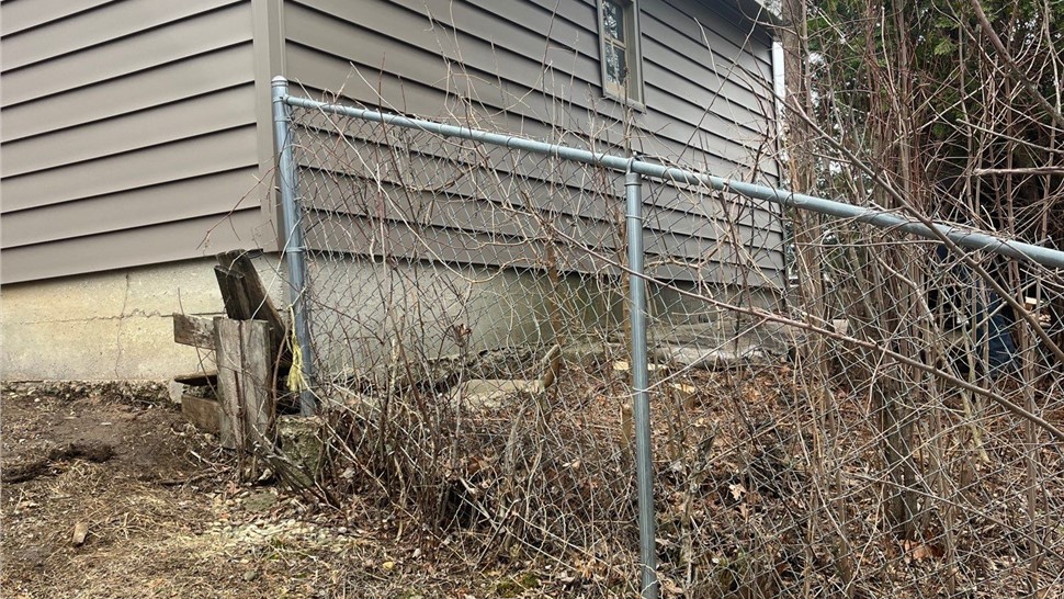 Seamless Gutters Project in Waukee, IA by Midwest Construction