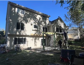 Decks, Sunrooms, Windows Project in Johnston, IA by Midwest Construction