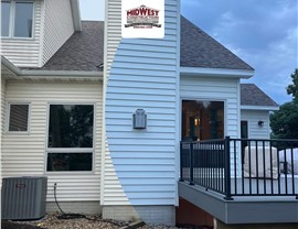 Seamless Gutters, Siding Project in Norwalk, IA by Midwest Construction