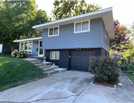 Seamless Gutters, Siding Project in West Des Moines, IA by Midwest Construction