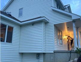 Seamless Gutters, Siding Project in Norwalk, IA by Midwest Construction