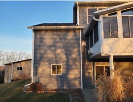 Decks, Doors, Roofing, Seamless Gutters, Siding, Sunrooms, Windows Project in Osceola, IA by Midwest Construction