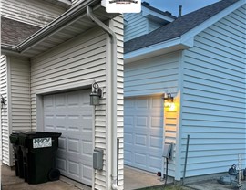 Seamless Gutters, Siding Project in Norwalk, IA by Midwest Construction