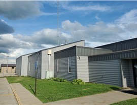 Seamless Gutters, Siding, Windows Project in Marshalltown, IA by Midwest Construction