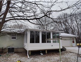 Seamless Gutters, Sunrooms Project in Ogden, IA by Midwest Construction