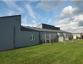 Seamless Gutters, Siding, Windows Project in Marshalltown, IA by Midwest Construction