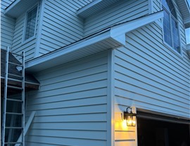 Seamless Gutters, Siding Project in Norwalk, IA by Midwest Construction