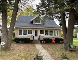 Seamless Gutters, Siding Project in Clarion, IA by Midwest Construction