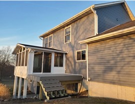 Decks, Doors, Roofing, Seamless Gutters, Siding, Sunrooms, Windows Project in Osceola, IA by Midwest Construction