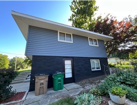 Seamless Gutters, Siding Project in West Des Moines, IA by Midwest Construction