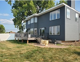 Seamless Gutters, Siding, Windows Project in Johnston, IA by Midwest Construction