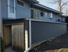 Siding, Sunrooms Project in Newton, IA by Midwest Construction