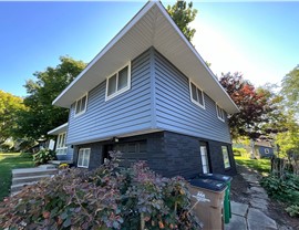 Seamless Gutters, Siding Project in West Des Moines, IA by Midwest Construction