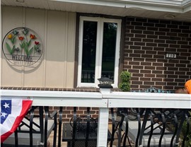 Seamless Gutters, Siding Project in Pleasant Hill, IA by Midwest Construction