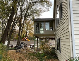 Decks, Sunrooms, Windows Project in Johnston, IA by Midwest Construction