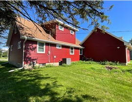 Seamless Gutters, Siding, Windows Project in Roland, IA by Midwest Construction