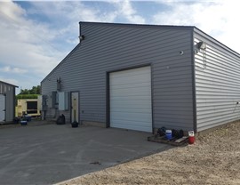 Seamless Gutters, Siding, Windows Project in Marshalltown, IA by Midwest Construction