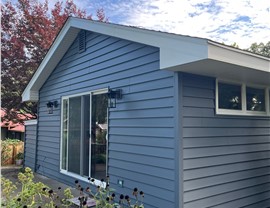 Seamless Gutters, Siding Project in West Des Moines, IA by Midwest Construction