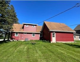 Seamless Gutters, Siding, Windows Project in Roland, IA by Midwest Construction