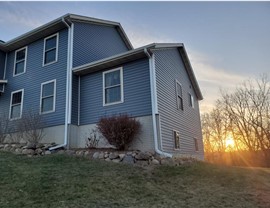 Decks, Doors, Roofing, Seamless Gutters, Siding, Sunrooms, Windows Project in Osceola, IA by Midwest Construction