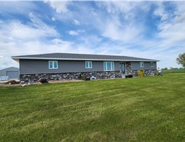 Manufactured Stone Siding, Siding, Windows Project in Osceola, IA by Midwest Construction