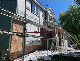 Roofing, Seamless Gutters, Siding Project in West Des Moines, IA by Midwest Construction