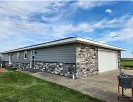 Manufactured Stone Siding, Siding, Windows Project in Osceola, IA by Midwest Construction