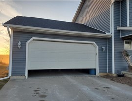 Decks, Doors, Roofing, Seamless Gutters, Siding, Sunrooms, Windows Project in Osceola, IA by Midwest Construction