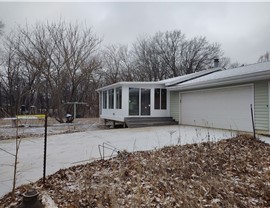 Seamless Gutters, Sunrooms Project in Ogden, IA by Midwest Construction