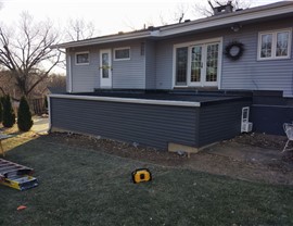 Siding, Sunrooms Project in Newton, IA by Midwest Construction