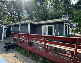 Seamless Gutters, Siding Project in Mason City, IA by Midwest Construction