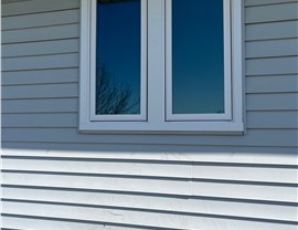 Manufactured Stone Siding, Siding, Windows Project in Osceola, IA by Midwest Construction