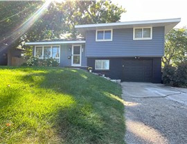 Seamless Gutters, Siding Project in West Des Moines, IA by Midwest Construction