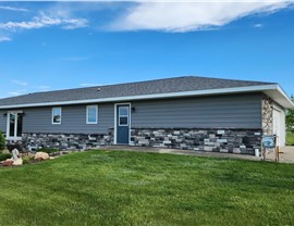 Manufactured Stone Siding, Siding, Windows Project in Osceola, IA by Midwest Construction