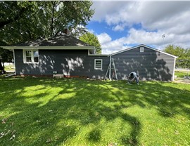 Seamless Gutters, Siding Project in Mason City, IA by Midwest Construction